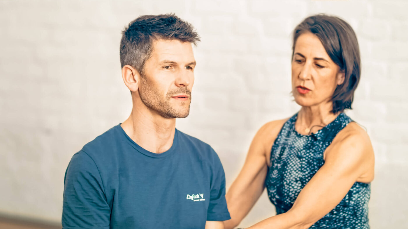 Maria explains with Wolfgang the Pilates breathing